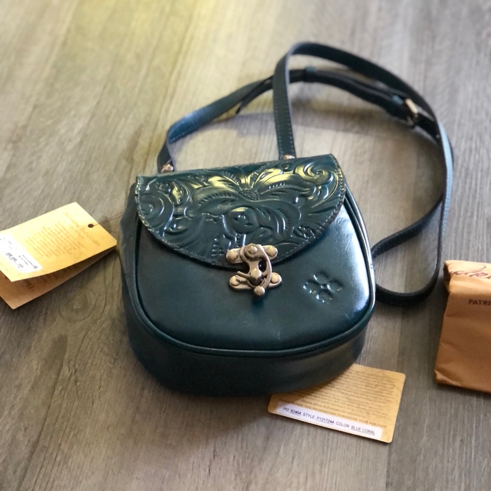 Patricia Nash Burnished Tooled Rocca Leather Saddle Bag Blue Coral NWT Dust Bag